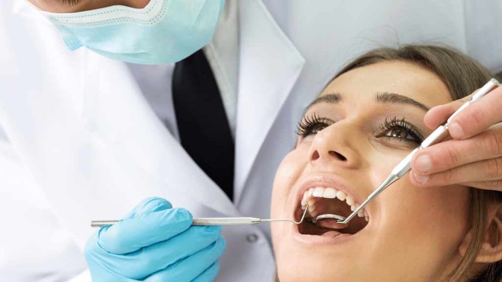 dentist working on patients mouth